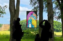 Stained glass window in a wood