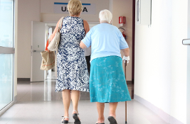 Two women in a hospital corridor