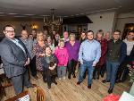 Cllr Chris Hood (left) alongside members of the Shared Lives service, providers and users at the Shared Lives Christmas party. 