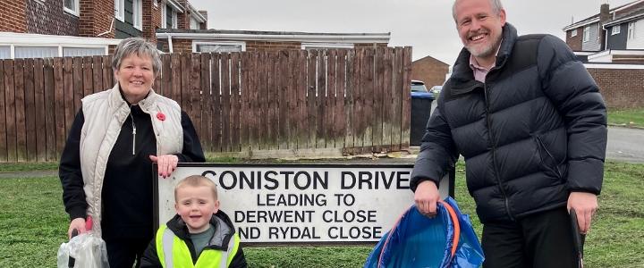 Alfie with his grandmother Gwyneth and Cllr Mark Wilkes picking litter - mobile version